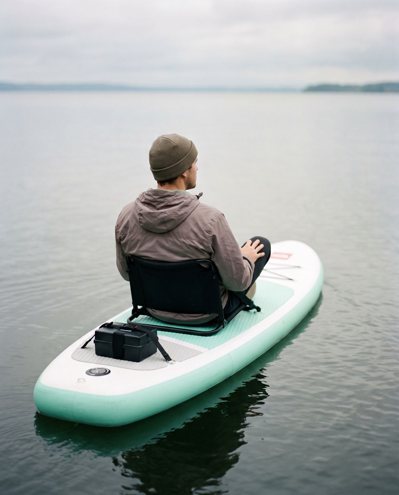 Rider lounging on an AerWave board at golden hour